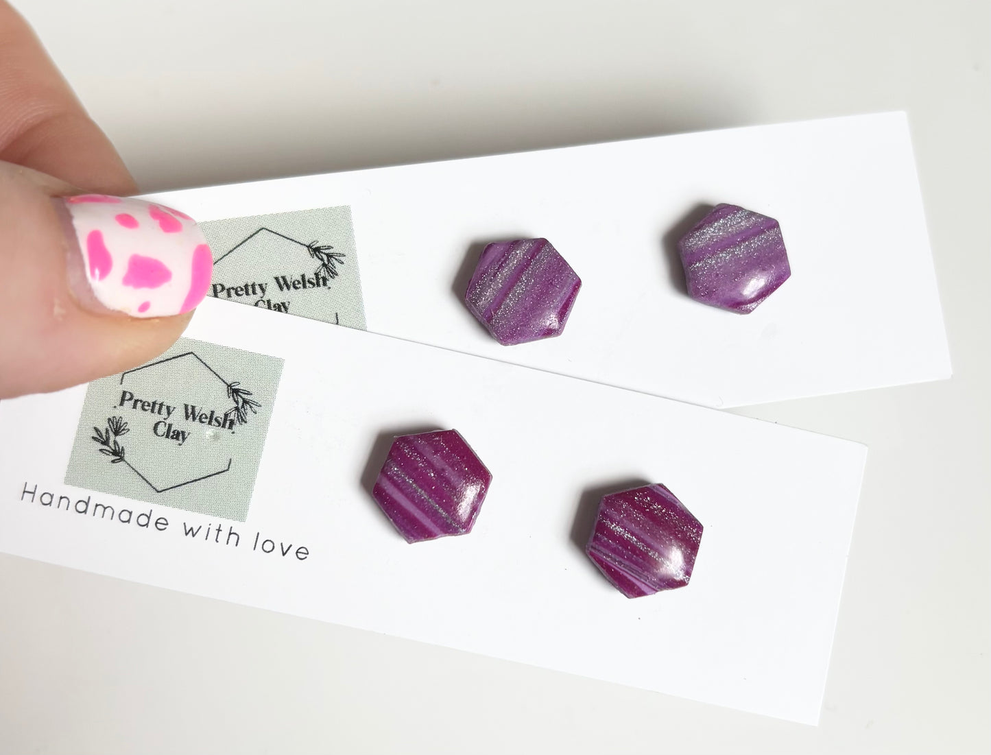 Cosmic plum hexagon studs