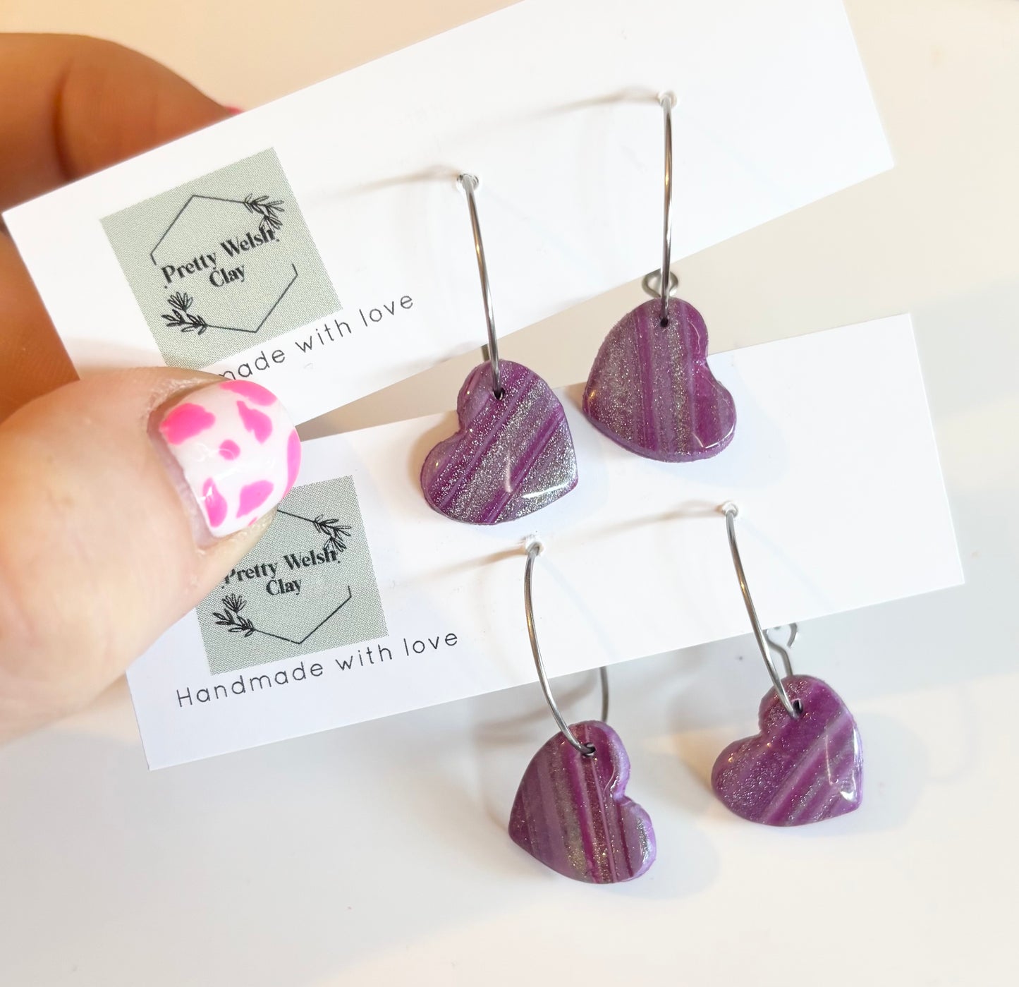 Cosmic plum heart hoops