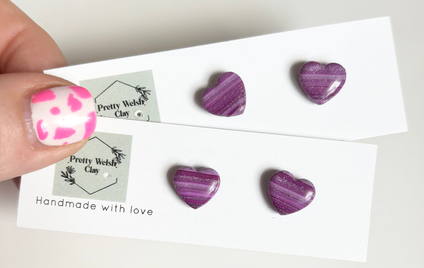 Cosmic plum heart studs