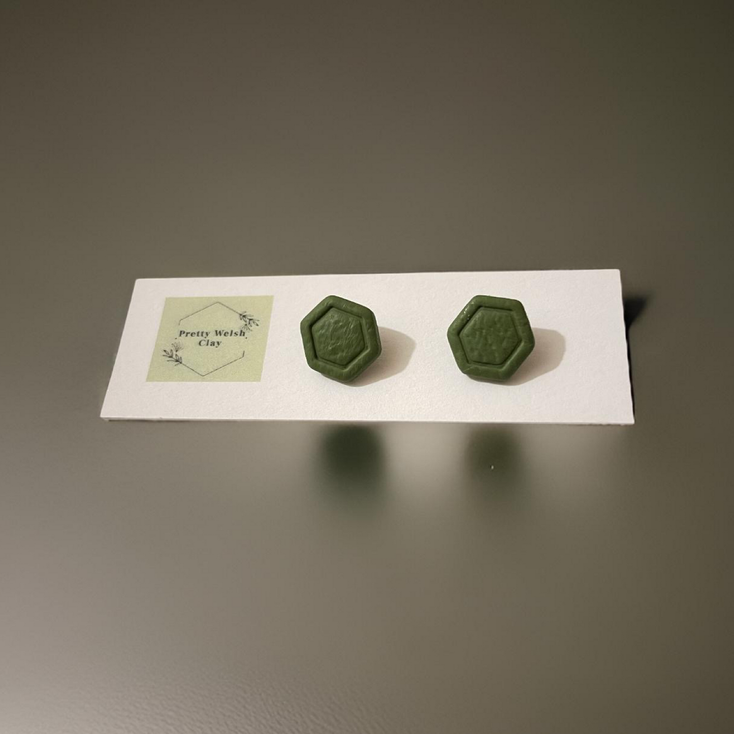 Green hexagon studs