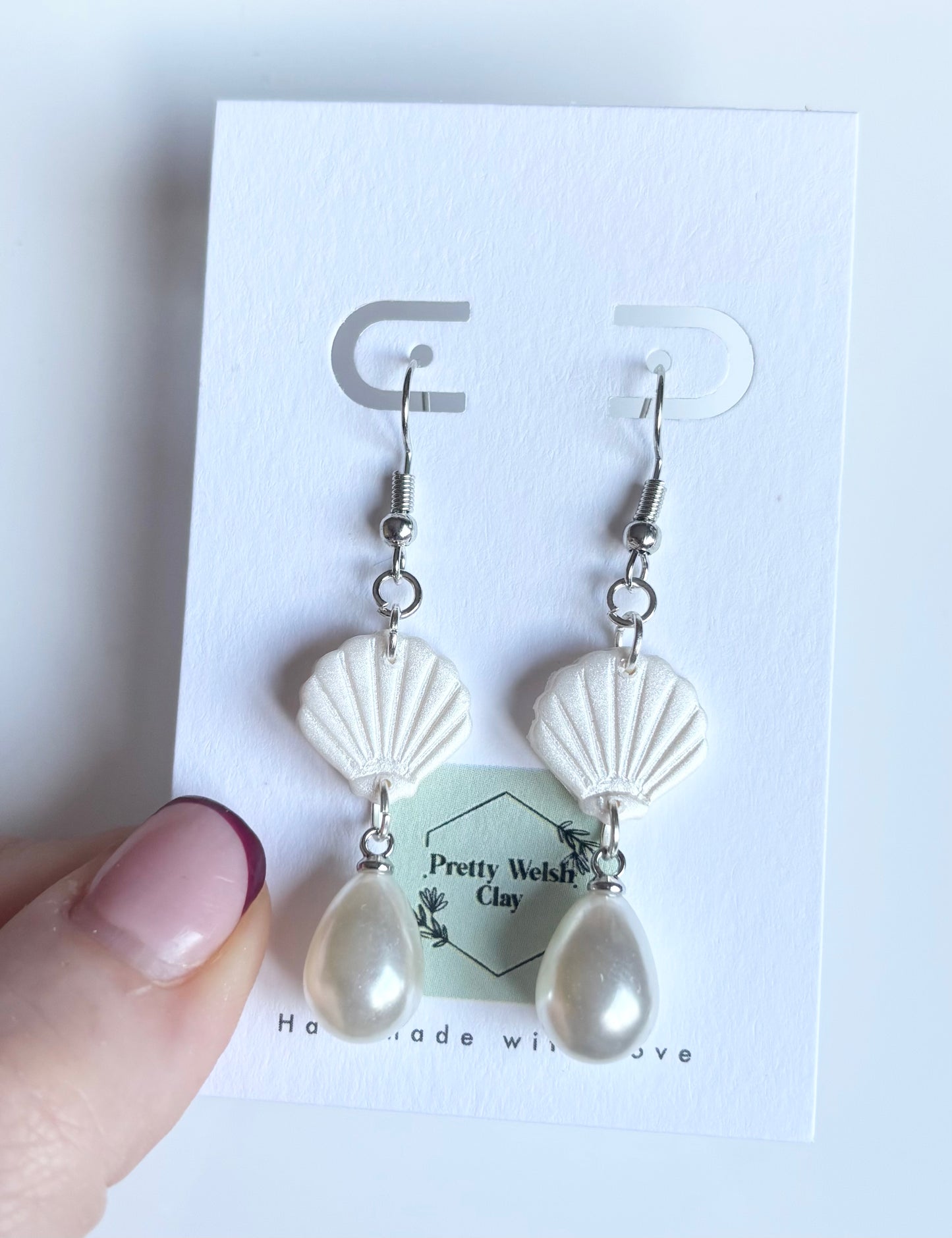 Shell with pearl