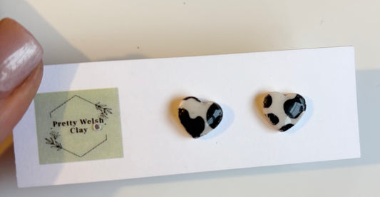 Cow print heart studs