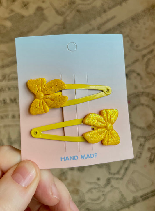 Yellow bow hair clips