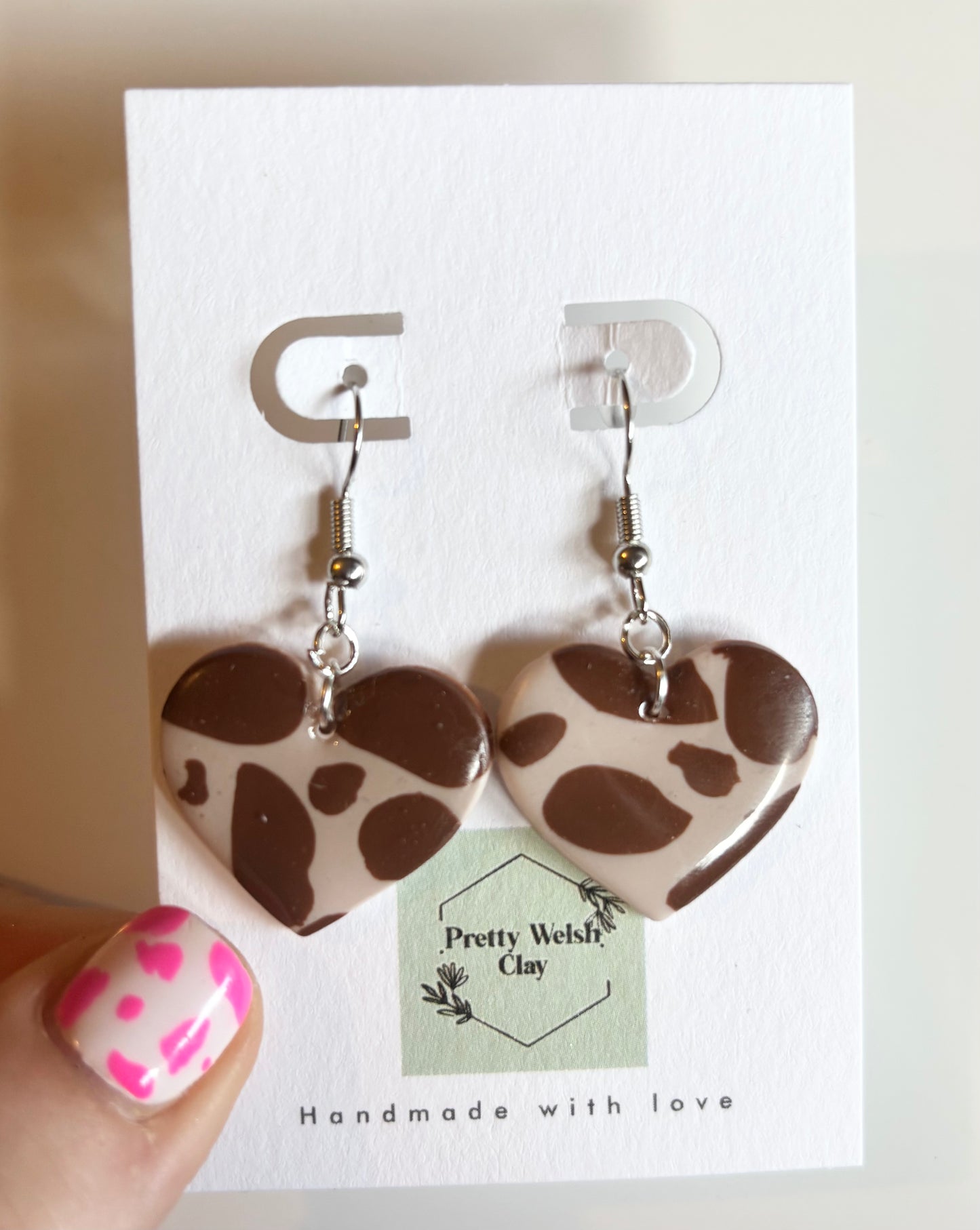 Cow print heart dangle
