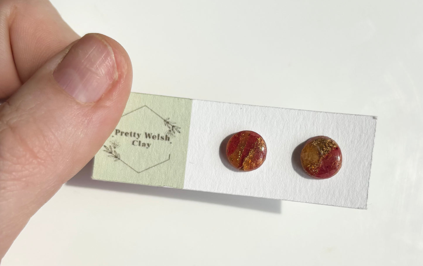 Orange and red stud