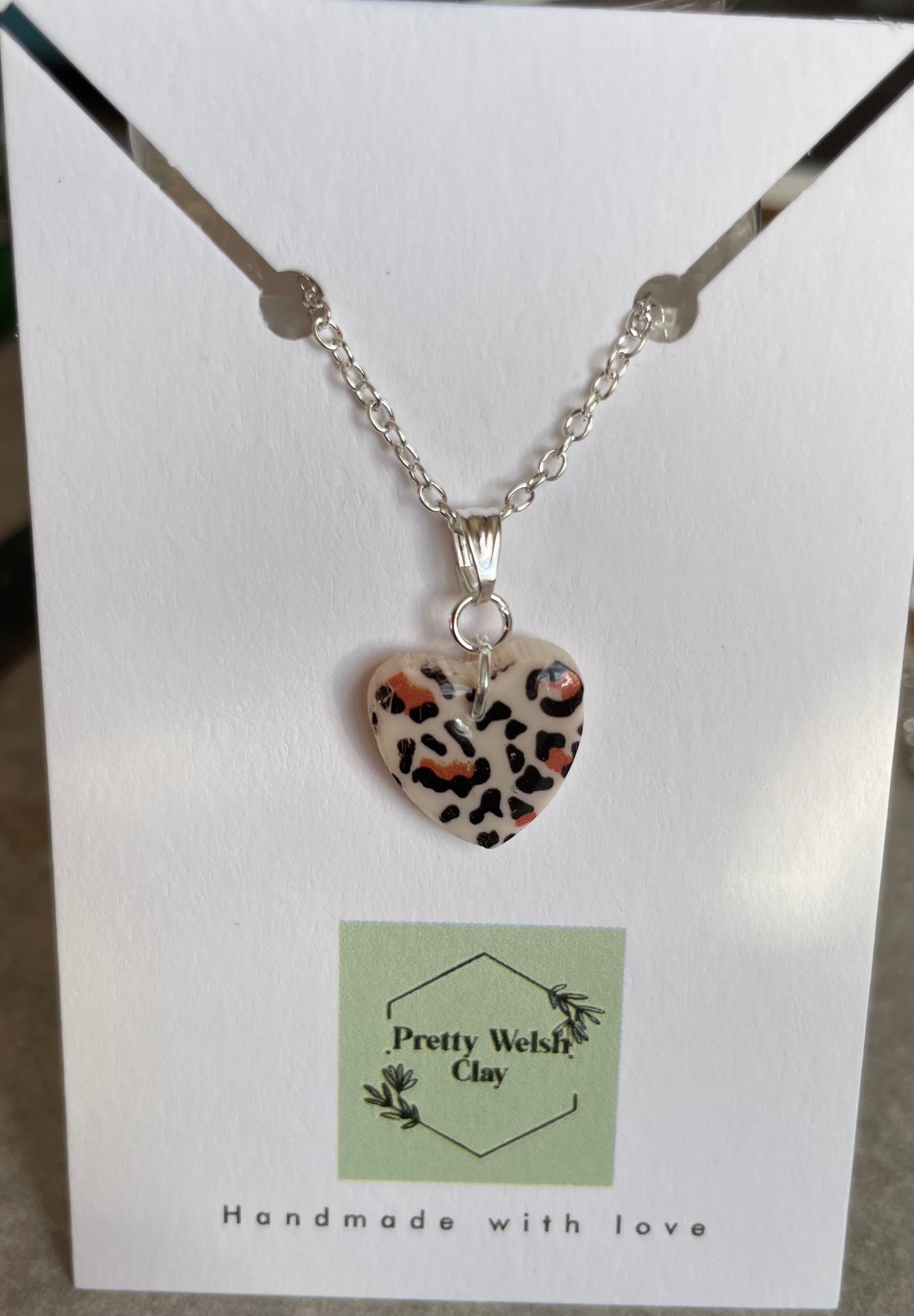 White leopard print heart necklace
