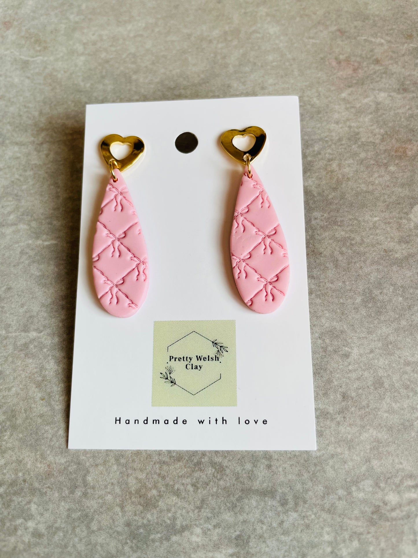 Ribbon print dangles