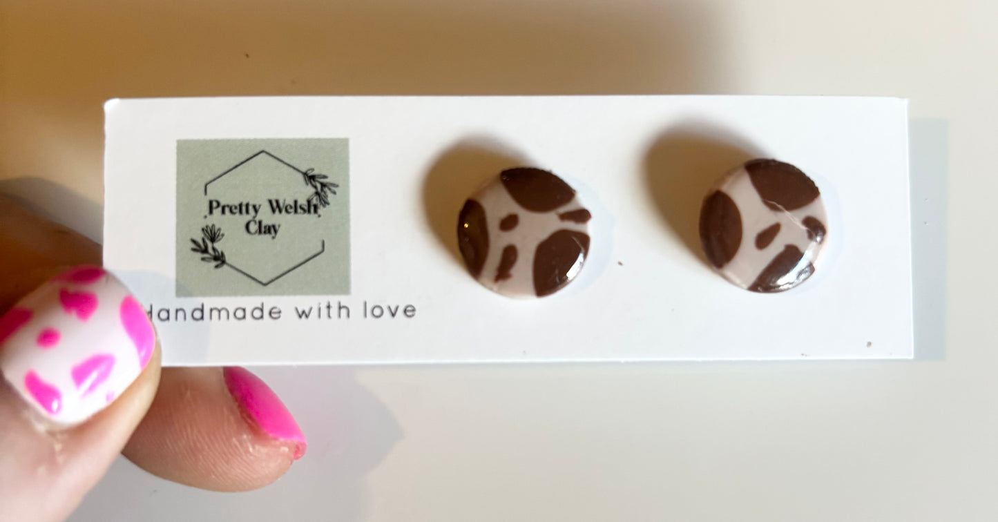 Cow print circle studs