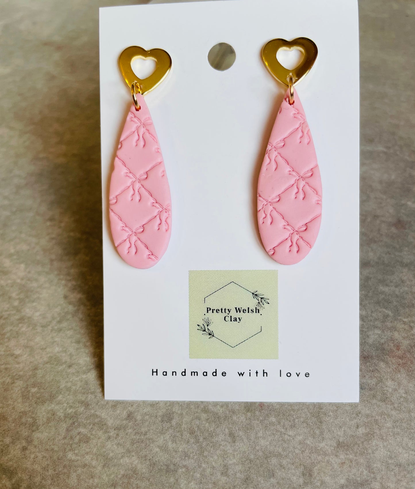 Ribbon print dangles