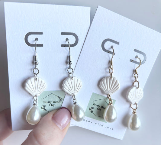 Shell with pearl
