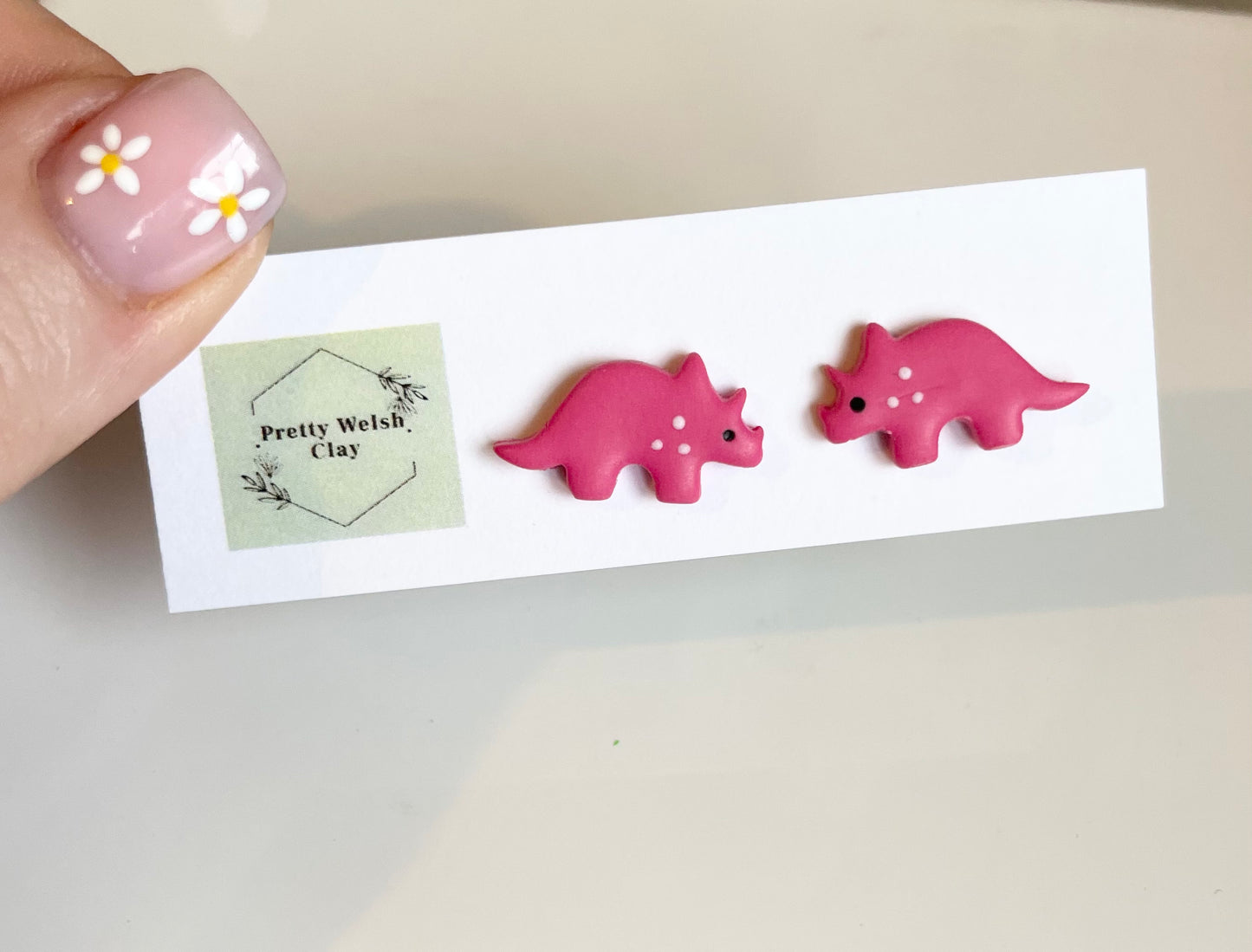 Triceratops studs