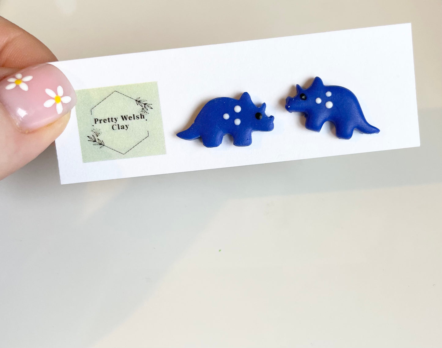 Triceratops studs