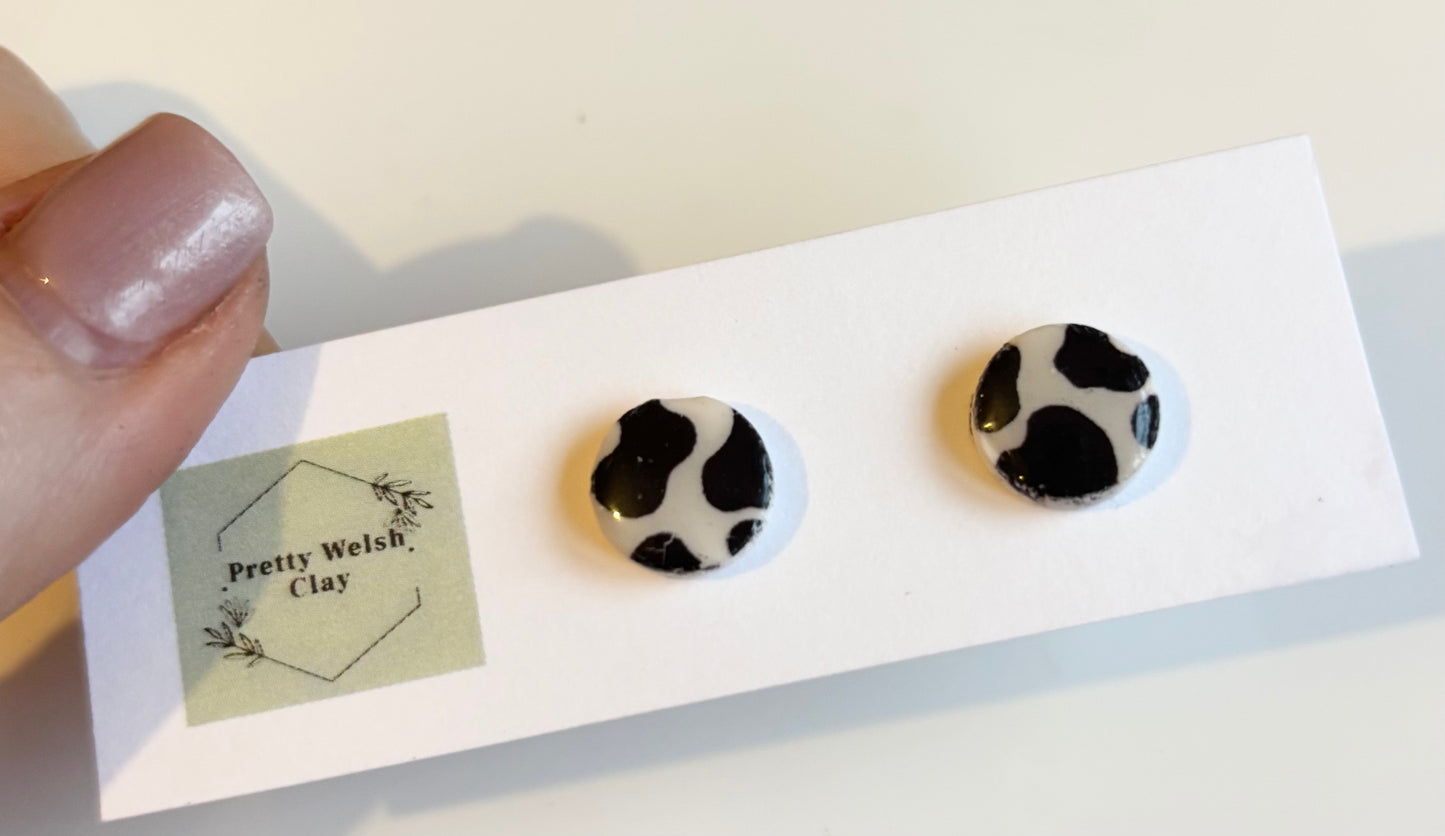 Cow print circle studs