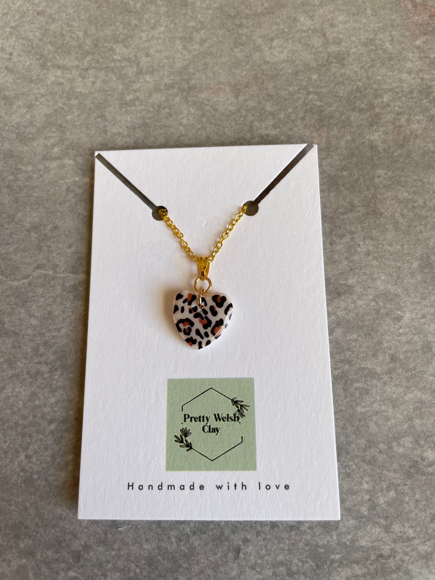 White leopard print heart necklace